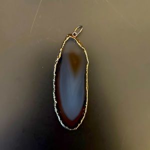 Crystal and gold pendant